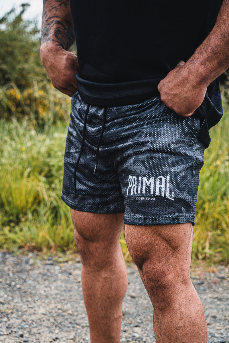 PRIMAL PERFORMANCE 2-IN-1 COMPRESSION SHORTS