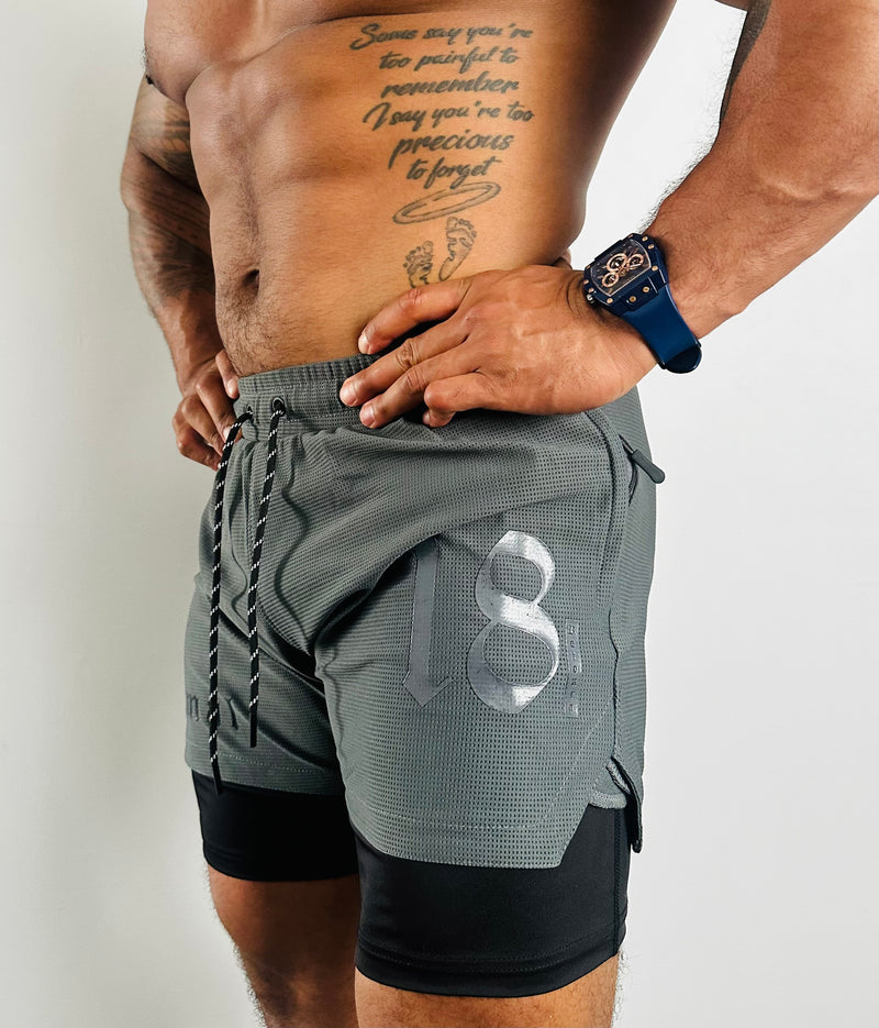 PRIMAL PERFORMANCE 2-IN-1 COMPRESSION SHORTS